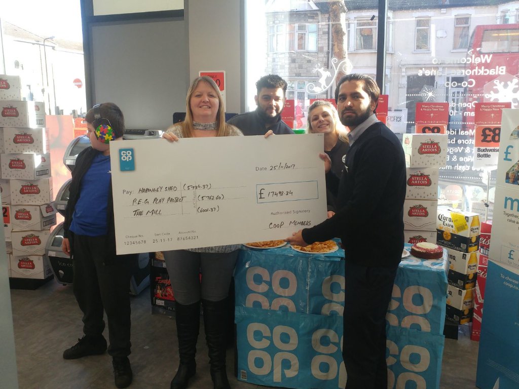 Walthamstow Black horse lane Coop handing over a check to three local charity's, over £17k via the community fund