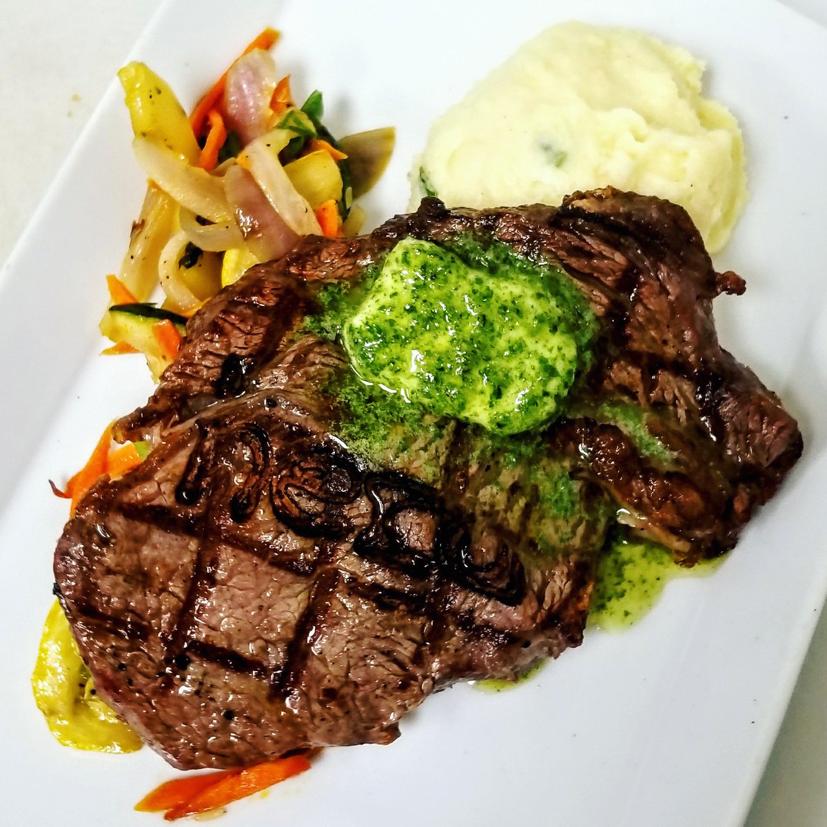 HerdOnMain's tweet photo. Saturday seems like just the occasion to come down and try our grilled 12 ounce cut Ribeye served with veggies and Irish champs, topped with house made fresh herb compound butter.
🍽🍷😁 https://t.co/KyKDWCpaFZ