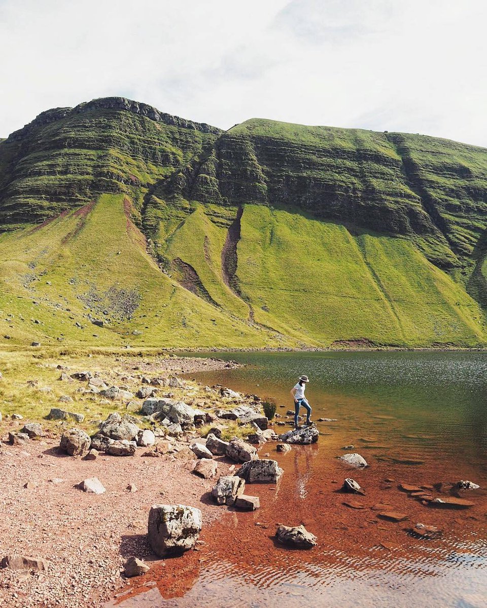 visitwales's tweet photo. Magical Llyn y Fan Fach on the northern edge of the Black Mountain in Carmarthenshire is the settings for the folklore legend 'The Lady of the Lake' and is a great place for a hike. Image by Alexandra Lhermite-Schwass https://t.co/i7q22ZZ20D https://t.co/aJDjUVaGM0