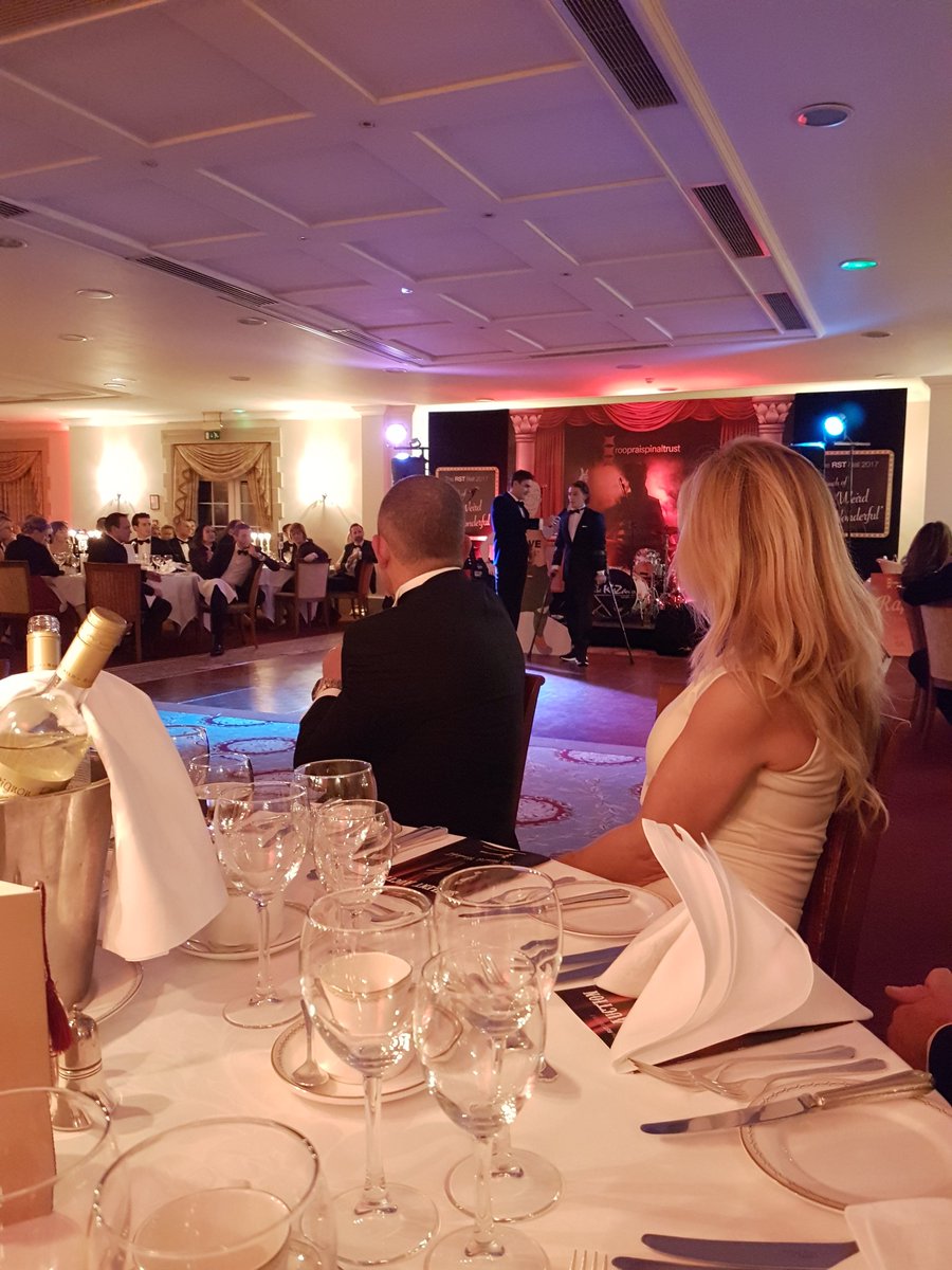 SpinalResearch's tweet photo. We're loving the #RSTBall what a fantastic event! #thankyou for inviting us. This is Andy speaking to Zac (who'll be running/walking #londonmarathon for us both in 2018!) #TeamRST #TeamSpinal https://t.co/JZdn3xyEF1