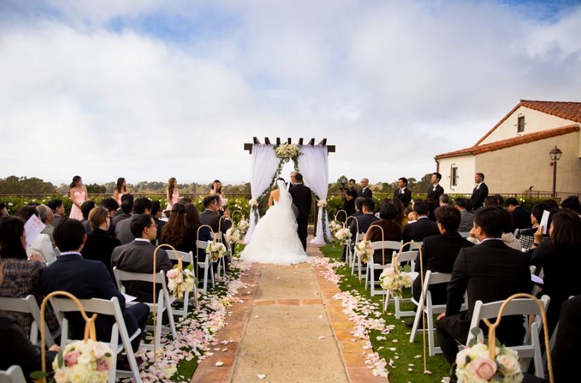 Another beautiful ceremony in PVGC's wedding garden today ... the clouds add some drama!