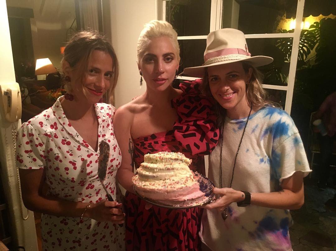 LGDoingThings's tweet photo. Lady Gaga showing off the lopsided cake she baked for her friend’s birthday party (2016) https://t.co/f380LubsJ6