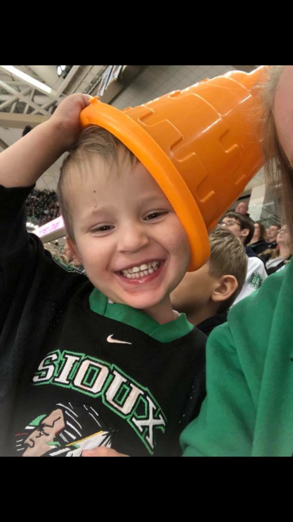 Ryandante's tweet photo. Tate’s first @UNDmhockey game #NCHCFan #orangebucket https://t.co/lVEmvm461K