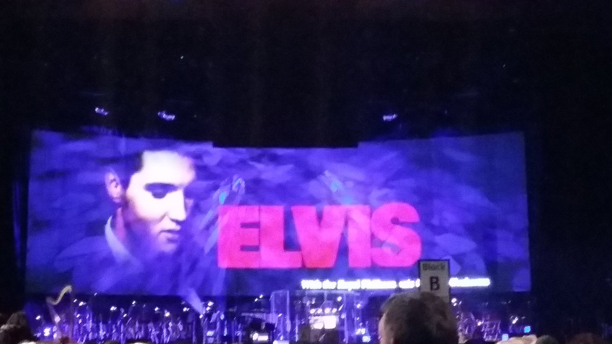 julie_jones30's tweet photo. He's been gone 40 years but can still fill an arena! Hubby loved his birthday treat @MetroRadioA @rpoonline #ElvisOnScreen #livewellwithdementia https://t.co/RQOVtRedWD