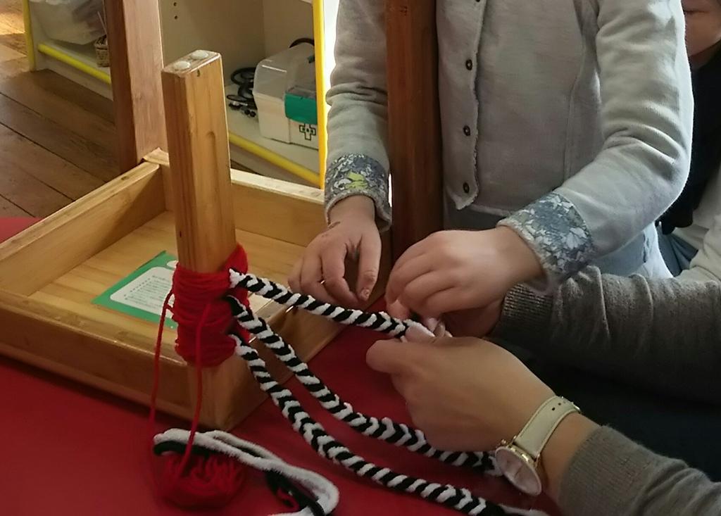 rogerwildenz's tweet photo. Parents &amp; chn braiding Maori poi strings for winter concert. Can you follow the pattern? #learningatkis #ECEmaths https://t.co/omLnkZtlRu