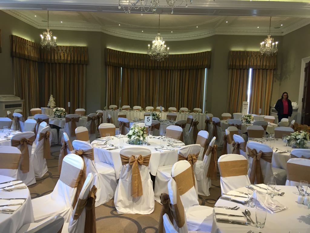White chair covers and hessian sashes for yesterdays wedding . We wish Louise and Lee every happiness
