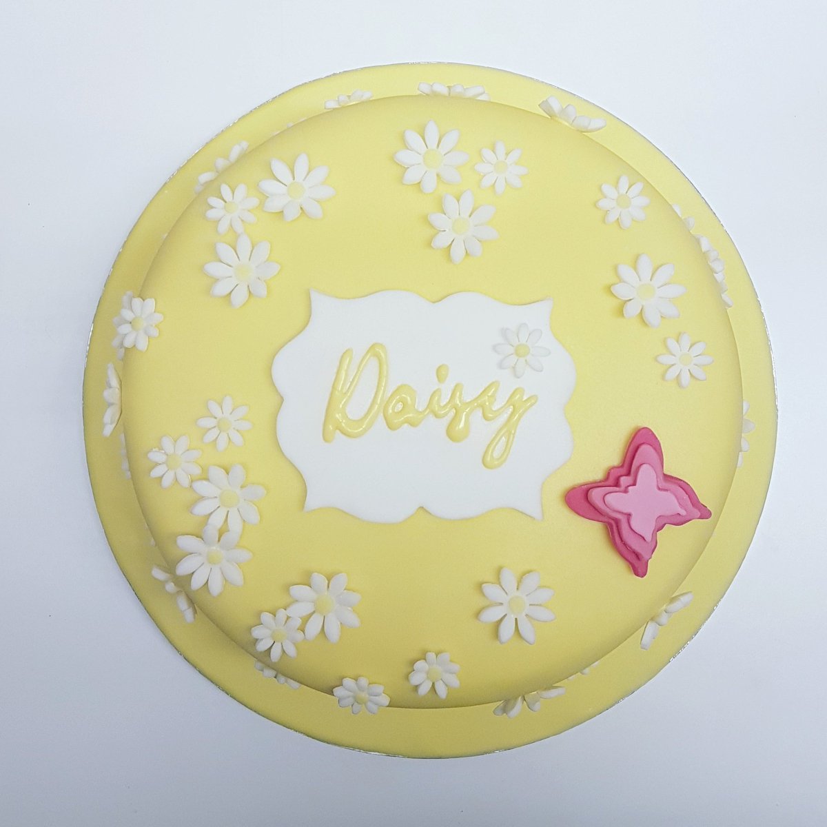HoopLaCatering's tweet photo. This weekend we made and delivered this special christening cake for a small family gathering. A classic sponge with raspberry jam, vanilla buttercream and fondant icing. 
#christening #cake #daisy #fondant #sugarwork #baking #party #catering #butterfly #piping #family https://t.co/3XT9ciQleC