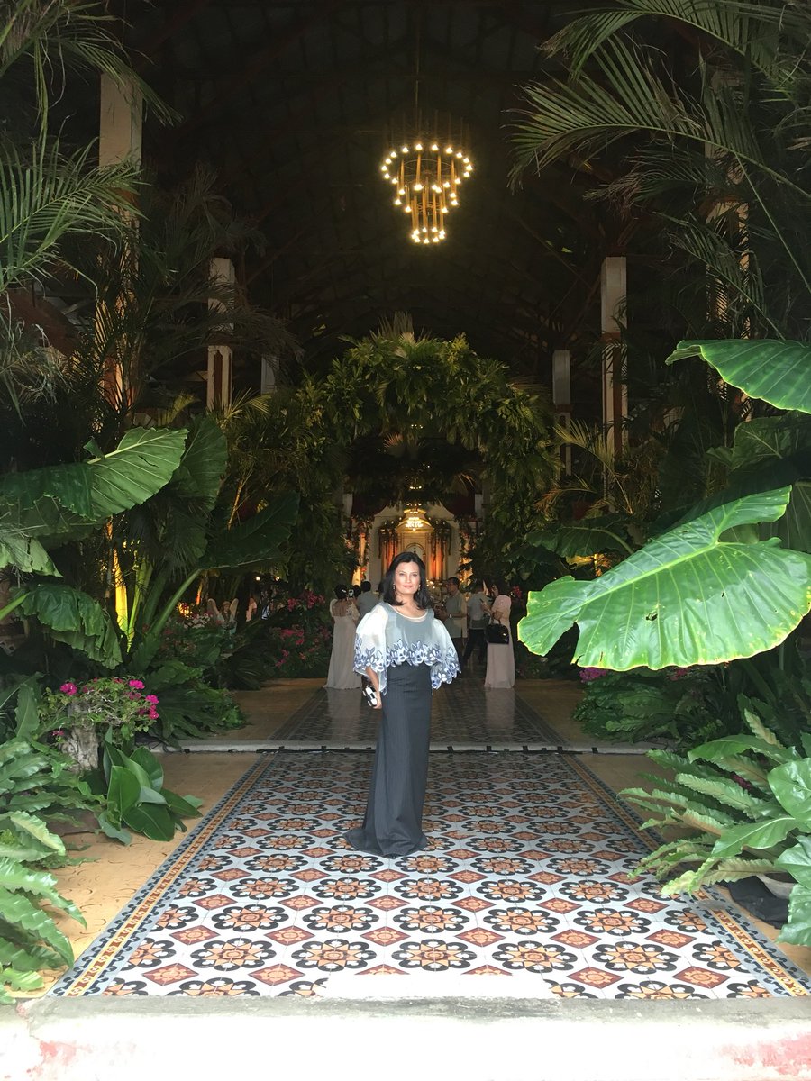 DaphneOP's tweet photo. So now I post fashion stuff. My gown was designed by #JoeySamson. Dresscode was modern filipiniana. Since I was flying to Ilocos N for this wedding, I went all out. I asked for BIG sleeves. But the leaves at the #PaoayCathedral were bigger! Gorgeous setting. #mikegotcaradaway https://t.co/RHvNQDcsqV
