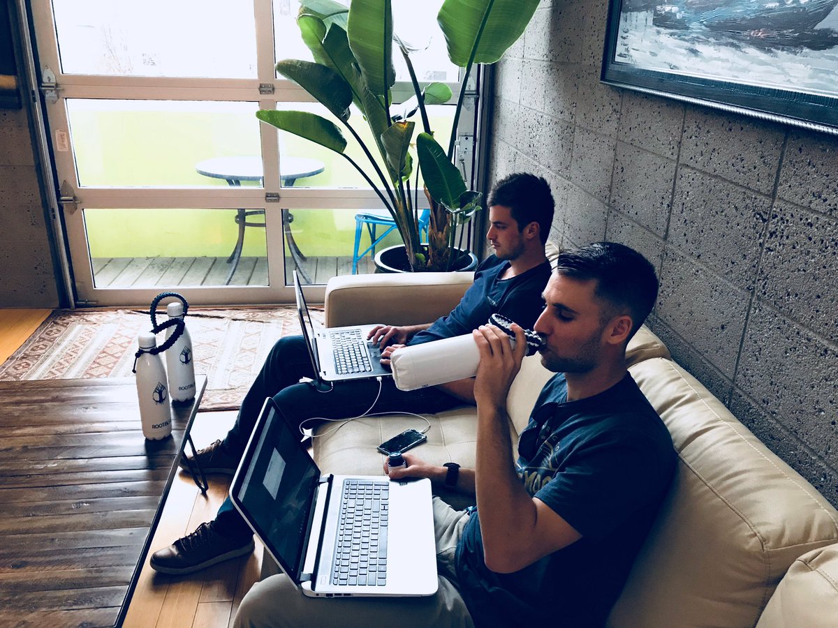 rootblueorg's tweet image. It's a gloomy day today, so the Rootblue co-founders are hard at work indoors. What are you doing on this #RainyDay?