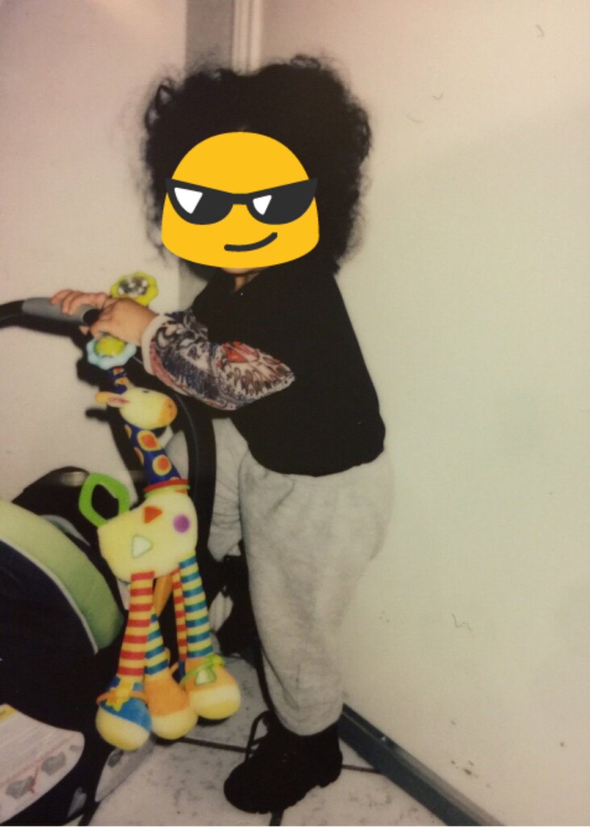 My sister <a href="/onjena/">Zonk</a> sent a t-shirt with tattoo sleeves for my 1 year old daughter. 

So I dressed her in black Timbs. 

My tough baby girl loves her giraffe. 😍