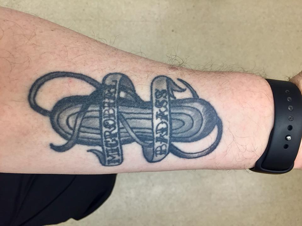 markowenmartin's tweet photo. When a microbiology student saw my first tattoo, he exclaimed "You are a microbial badass, Doc!"   @vexedmuddler designed it, and Jayme Jack​ tattooed it on my left arm.  I always feel a little odd about it, since I don't like bragging.  But #MicrobialBadass is pretty sweet. https://t.co/mzcY8cF7x2