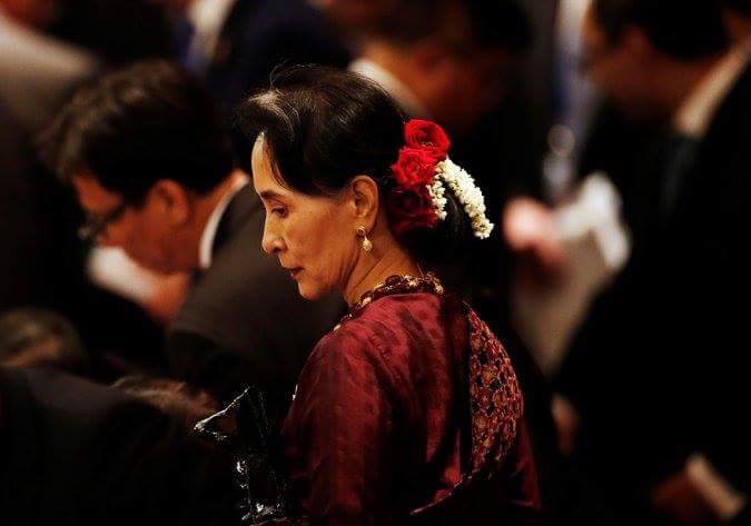 Suu Kyi will leave the west behind her.Bengili's crisis break the warming up period of newly born democracy n stability. silent is wiser .