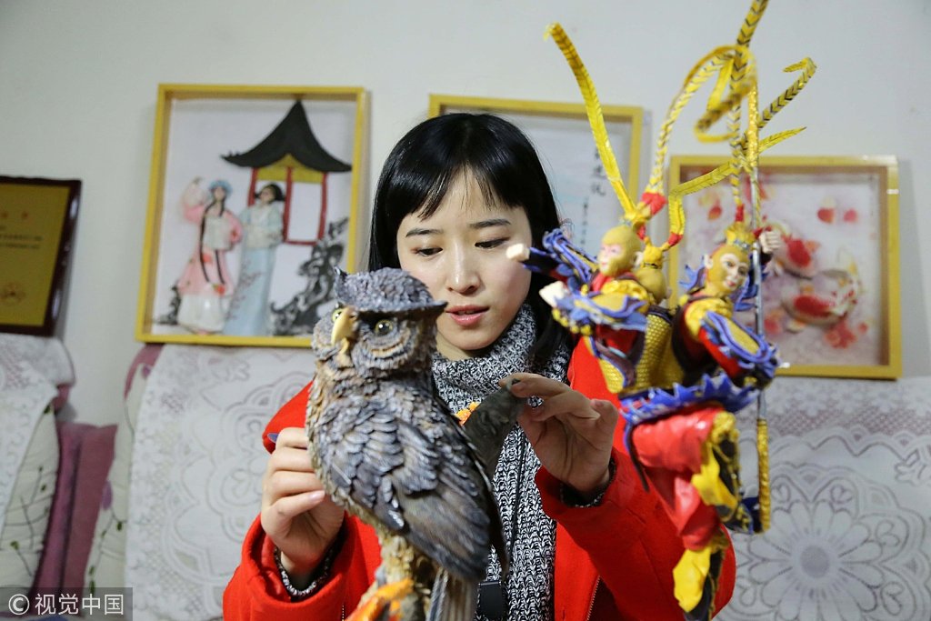 CGTNRadio's tweet photo. Liu Lijuan, a school teacher presents her handcrafted models made of dough. #DoughModeling is a traditional Chinese craft. The school teacher connects this art with modern characters, making the ordinary dough into vivid figurines. https://t.co/BuOrZyb5Z9 https://t.co/Hk8nPVNbBj