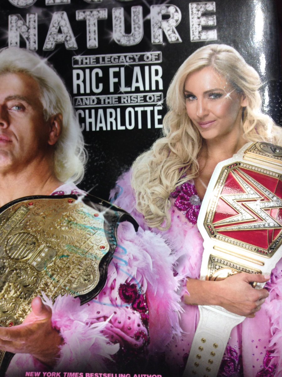 RayRayIIIWWE's tweet photo. It's hard to see because it's on the cover picture but thank you, @MsCharlotteWWE for signing my book. You made me really happy. https://t.co/omHmYYF51k