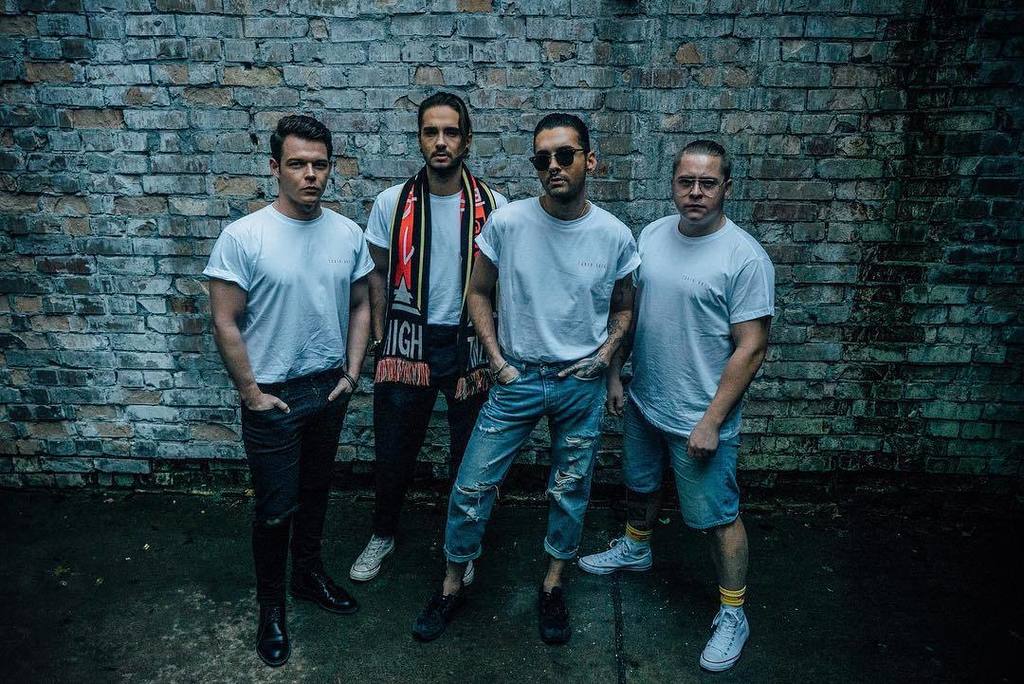 tokiohotel's tweet photo. 5% discount on everything only till 12p tomorrow 🎉 use the code: Cybermonday and enjoy your shopping 🎁PS: We're all wearing the white Logo Tshirt and @tomkaulitz is wearing out "Tanzen" scarf 🕺🏼 https://t.co/Vsy4dASglV https://t.co/YR94rNoTCx