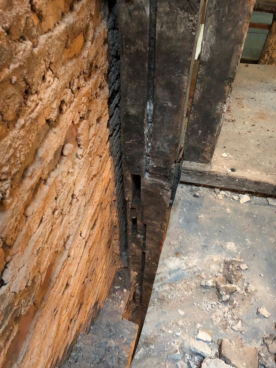 Architectnja's tweet photo. Not very exciting for the layman – but this photo shows the mortice for an original traceried window with a vertical shutter groove. 31 High St, Droitwich. https://t.co/DR98prj2sy
