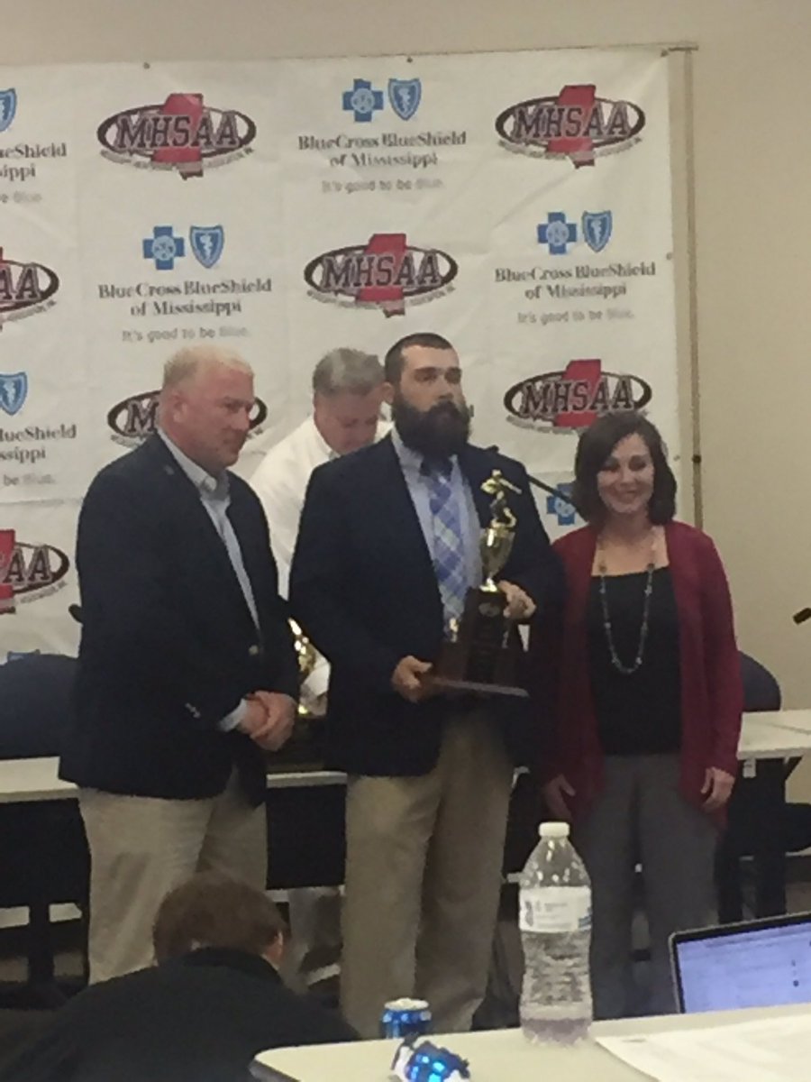 NW_Warriors's tweet photo. MHSAA presents Coach Ryan Keeton with South State Championship trophy. https://t.co/QrKUCpb0tQ