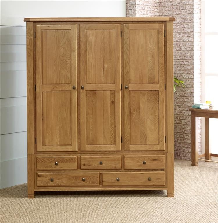 Providing a timeless style and sturdy oak finish this <a href="/birlea_ltd/">Birlea Furniture Ltd</a> Woodstock 3 Door 5 Drawer Wardrobe is the perfect solution to storing away your winter warmers! #furnituredesign #wardrobe #wardrobestylist #storage #design #bedroomdecor #bedroom #furniture goo.gl/bMHCos