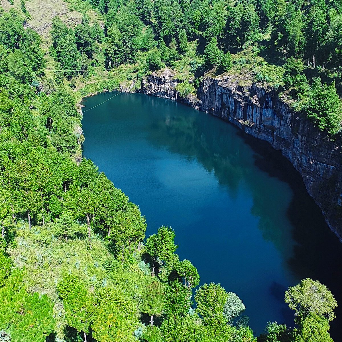 IleMadagascar's tweet photo. Lake Tritriva is a volcanic lake associated with many legends #VisitMadagascar #wedotourism https://t.co/I0AQwI1oFt