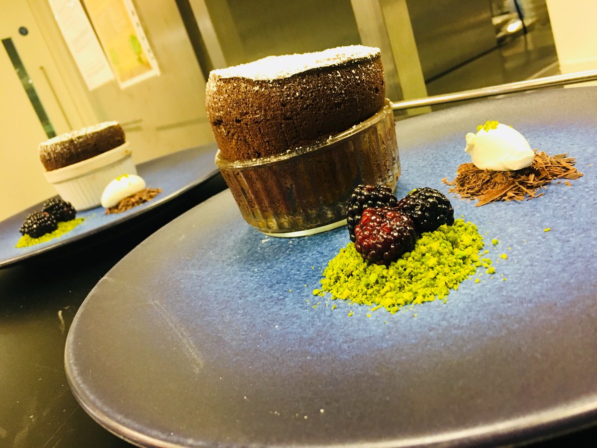 Won’t be beaten by a soufflé 👊🏻. Melt in the middle chocolate soufflé, Kirsch macerated blackberry, pistachio and vanilla creme fraiche #chef #food #souffle