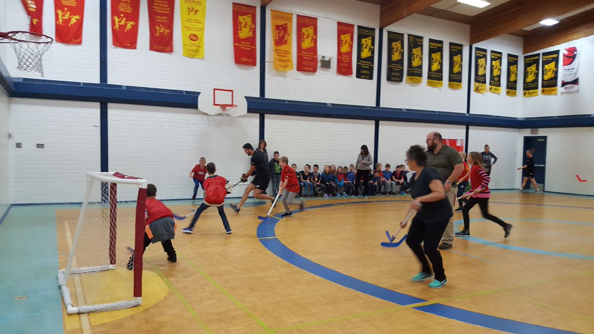 GWSmithSchool's tweet photo. Thank you to @elifalls20 and @MSalmon92 from the @rdcathletics program for helping us out with our Students vs. Staff floor hockey game last week. Thank you again to @Rebelshockey @1bookrd and @brouwersigmund for such an amazing literacy event to start the school year. https://t.co/MtSM1w6VEi