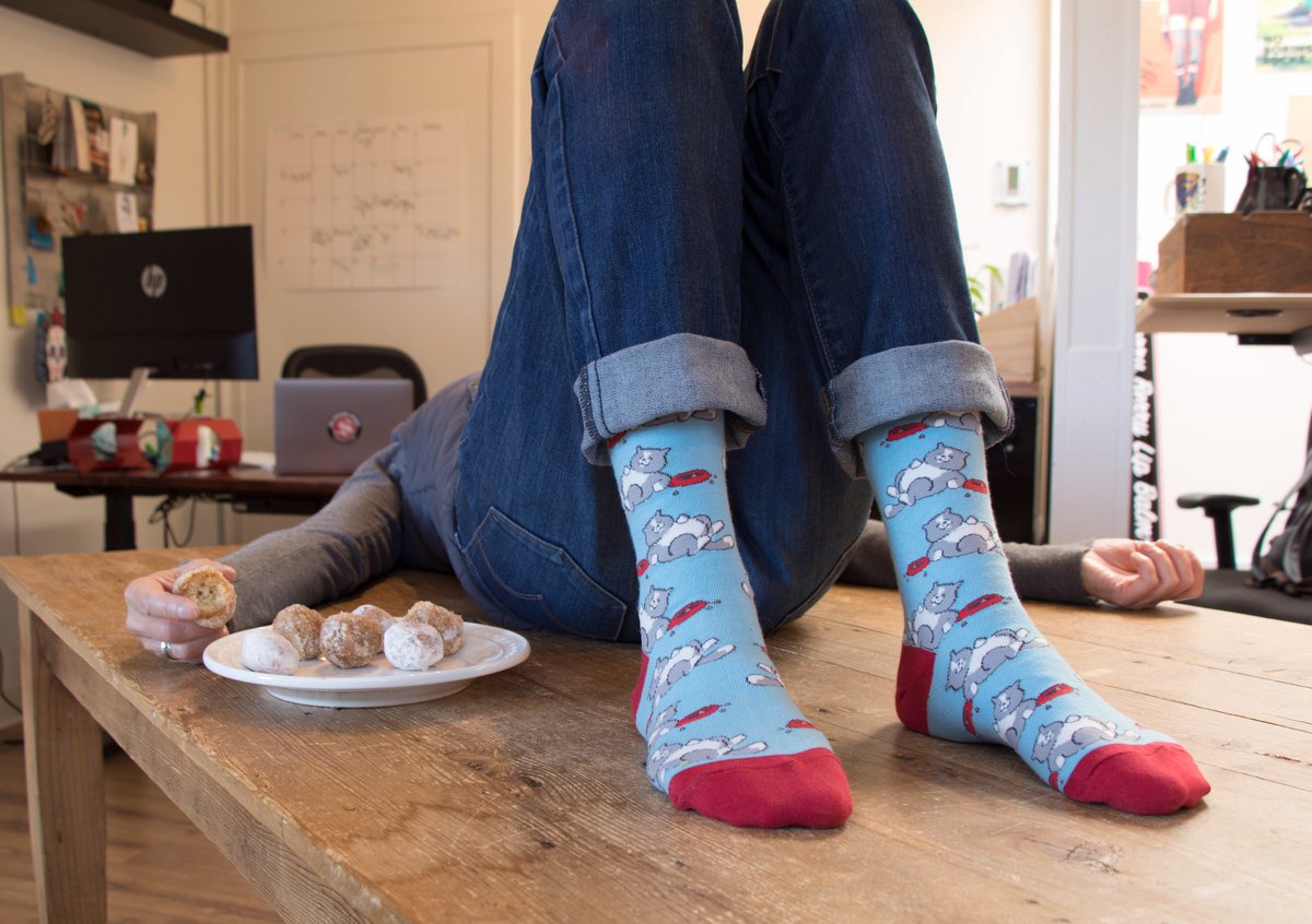 Socksmith's tweet photo. Anyone else still "working" off Thursday's meal? #catnap #donotdisturb #catsocks #postthanksgiving #nappingatwork #noboringsocks https://t.co/lOl35fWUOX