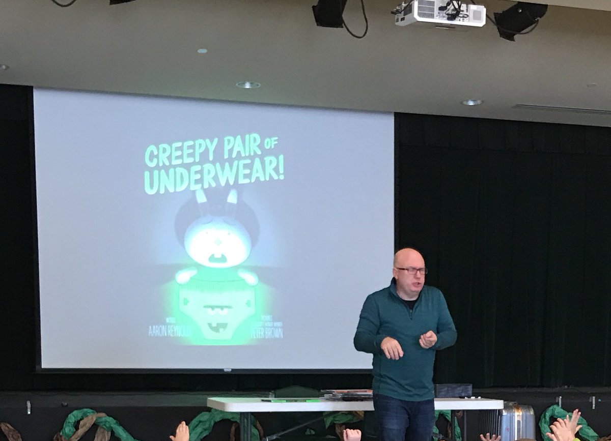 DianaColby's tweet photo. Best rules on asking questions! This guy is funny! Great author visit. @areynoldsbooks @ERESReads @KellerISD #kellerisdlibraries https://t.co/wqSzj4GTno