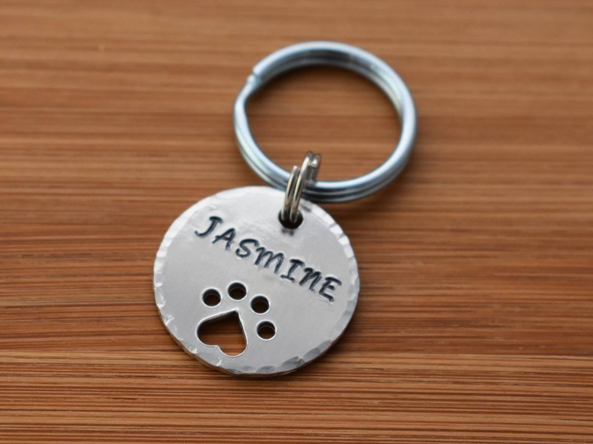 stampedbycoll's tweet photo. Excited to share the latest addition to my #etsy shop: Custom name pet tag with paw print cut out #nametag #pettag #catid #dogid #petidentification #stampedbycolleen https://t.co/bTqRunfiLR https://t.co/sQgwzPP1zr