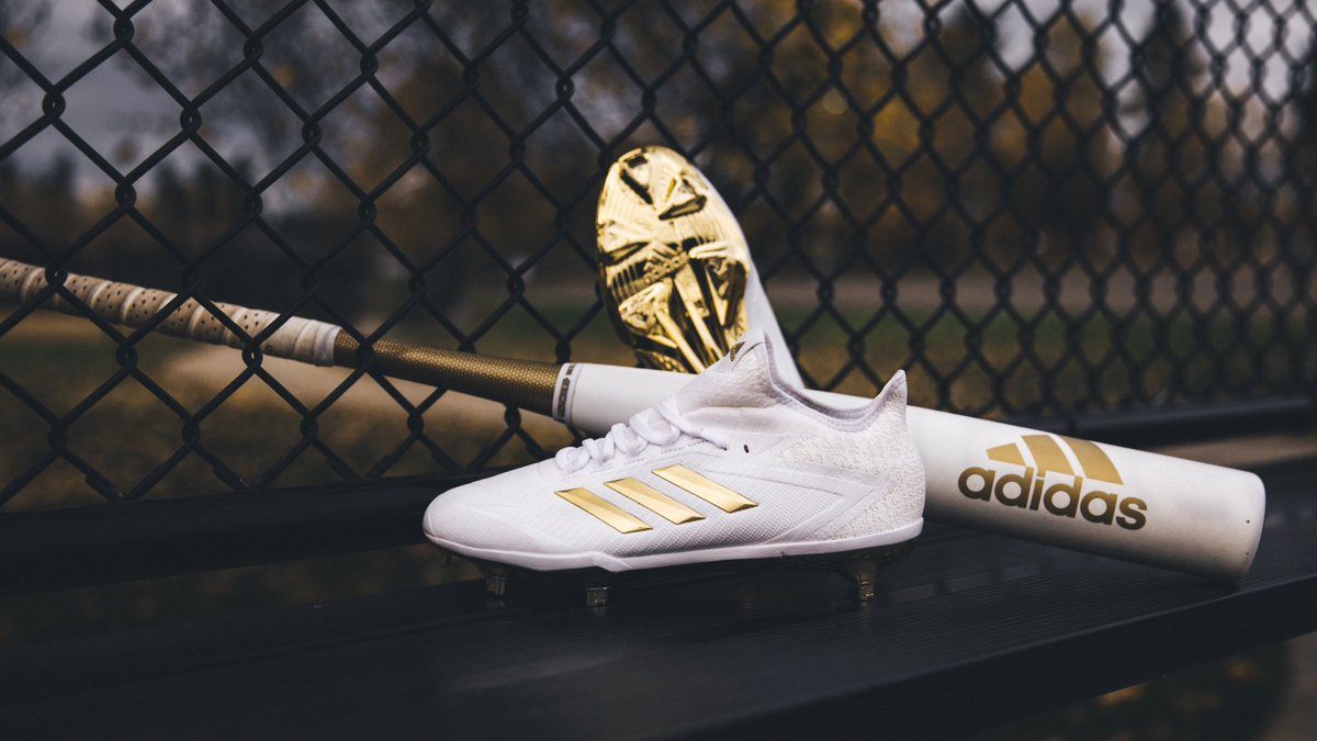 white and gold adidas cleats baseball