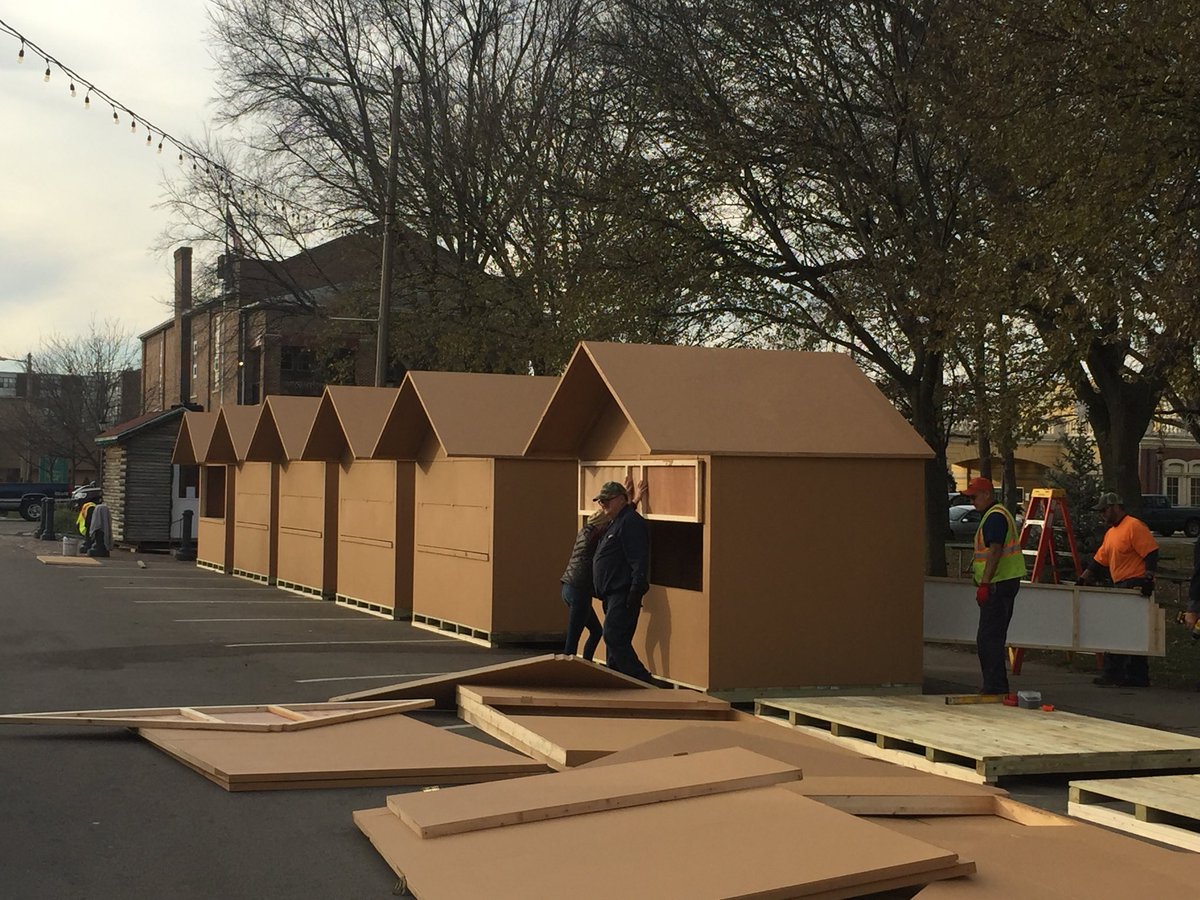 TT_cstanley's tweet photo. Housing for elves next to the Santa cabin at Washington Square? Nope! Vendor “huts” of the Chris Kringle Market the next two weekends. https://t.co/cJVyJgzEU4