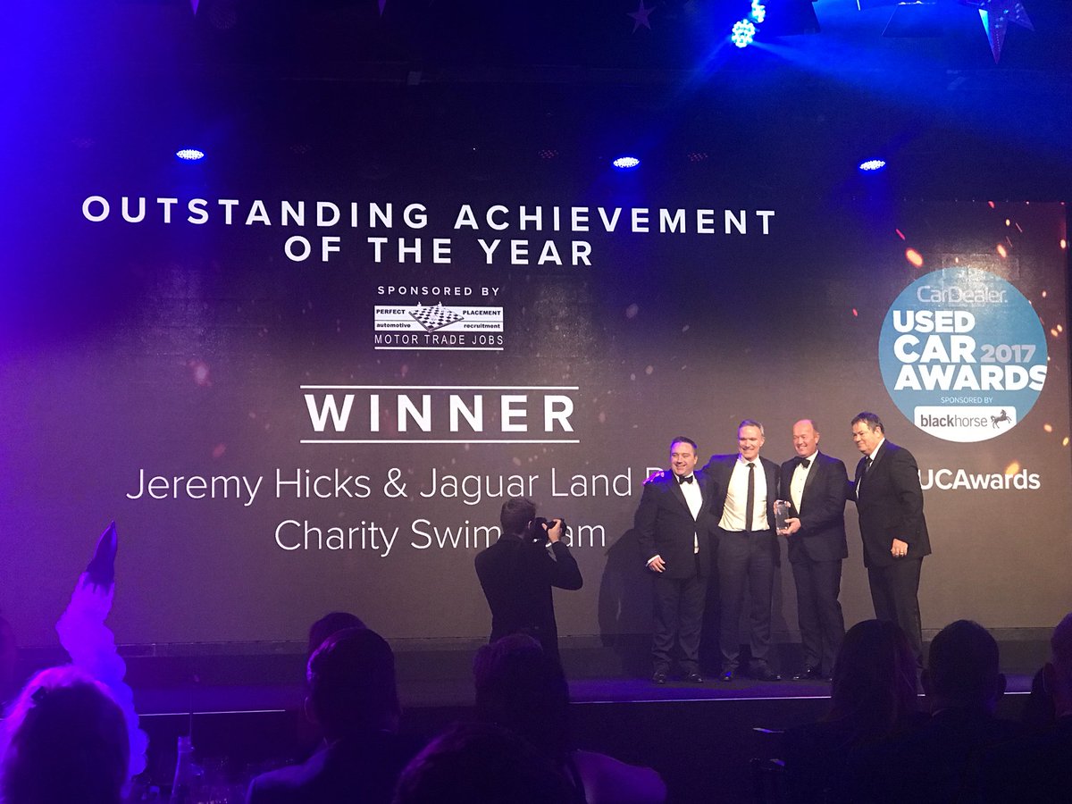 CarDealerMag's tweet photo. The Outstanding Achievement Award 2017 goes to @JeremyCHicks and the @JLR_News Swim Team! #UCAwards https://t.co/RnP9owD7gM