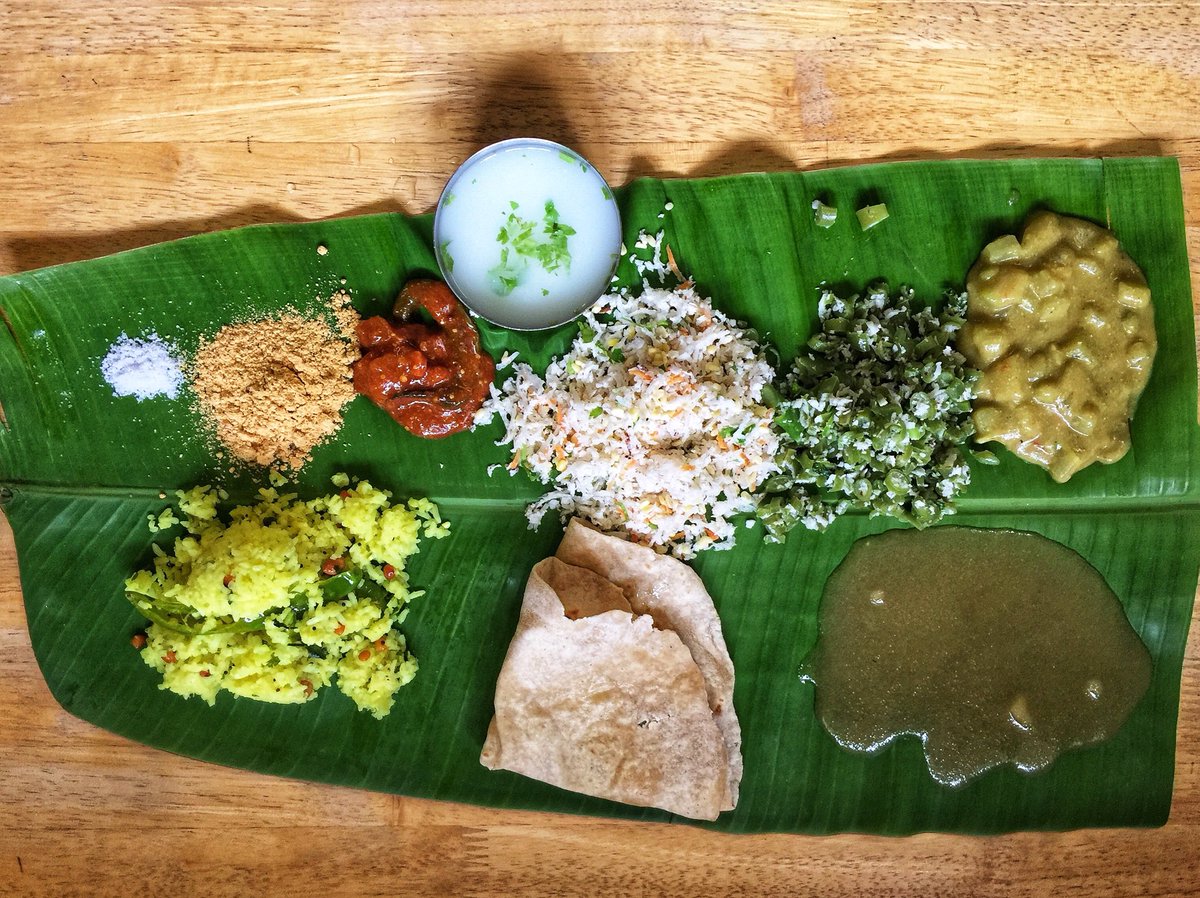 ThisSattvicLife's tweet photo. Simple and sattvic, this banana leaf #thali satisfies the taste, nutrition and energetic needs of the body! Check out Anima Madhva Bhavan in #Mysore for spectacular #plantbasedfood #ayurvedicfood https://t.co/C0Pla3b8eY