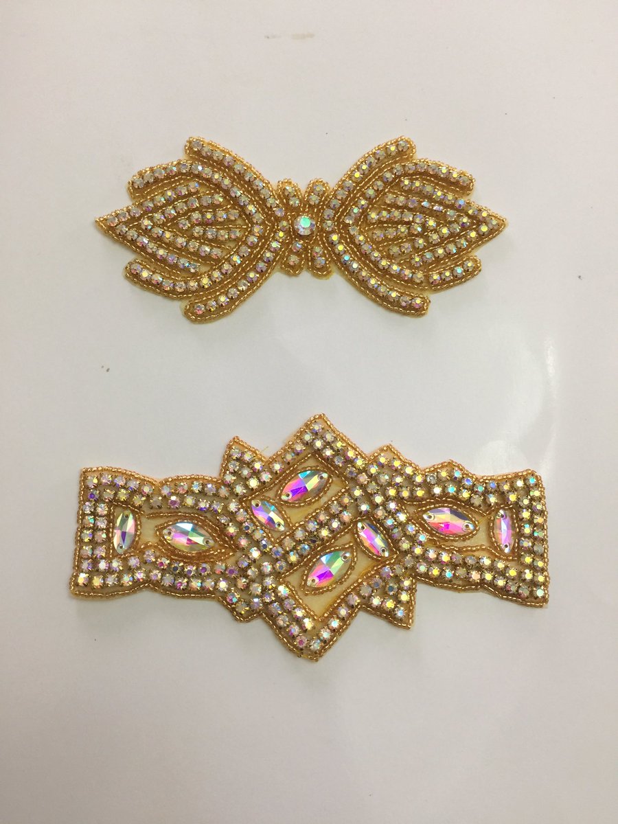 tailoring_shop's tweet photo. Rhinestone embellishment available in different colours  and designs #rhinestones #rhinestonedress #tailoringshop #fashiondesigner #fashion #trend #tailoringmaterialshop #availabletobuy #red #blue #green #silver #gold #availabletobuy #abuja #style https://t.co/jjMDfsrkkq