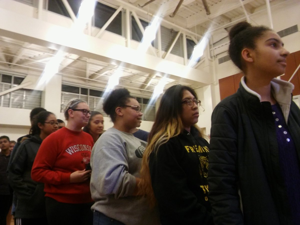 DarwinBondGraha's tweet photo. Students lined up to speak to #OUSD Oakland school board about controversial budget cuts. https://t.co/1S5Ao8k39t