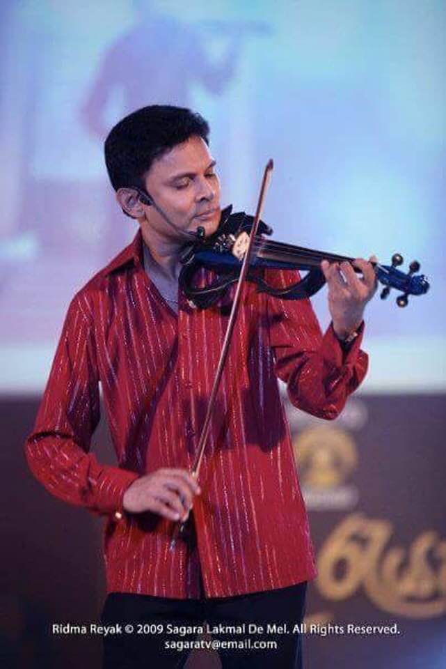 DJSlash9's tweet photo. A great violinist Ruwan Weerasekara | Rest in peace ! #lka https://t.co/zNz0ZOokgh