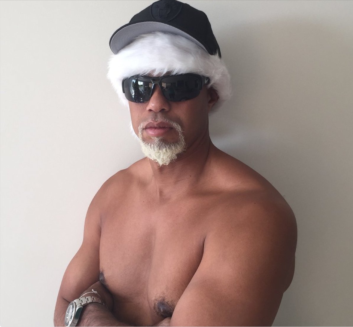 UrbanGolf's tweet photo. Excited for Tiger's return this week, but slightly concerned he may come out rocking his "traditional" Mac Daddy Santa look again #Tiger #deeplywrong #macdaddy #fingerscrossed https://t.co/WcN7UePgaT