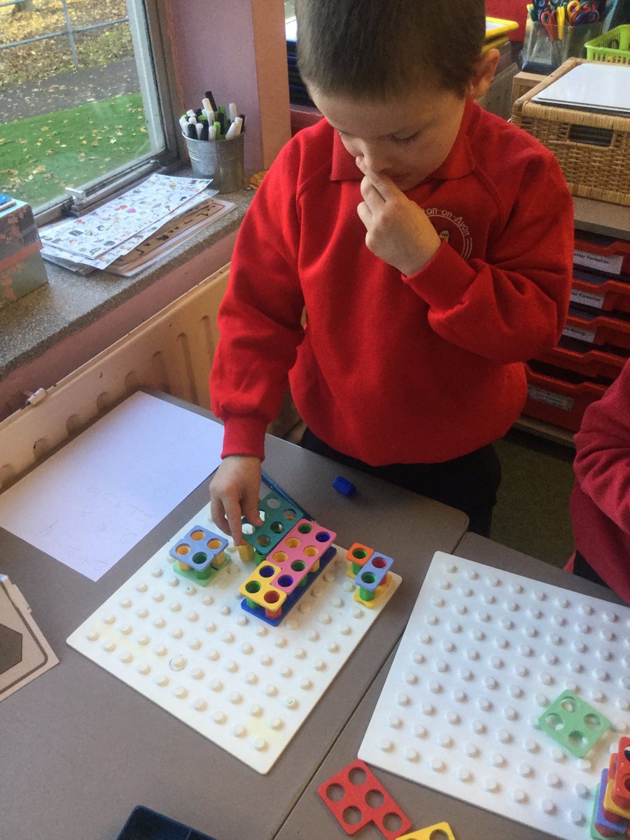 ashclass_TIS's tweet photo. A great visual activity to teach addition! We chose a numicon shape then put the pegs on top and found different ways to make that number #EYtalking https://t.co/T90oUUlYTu
