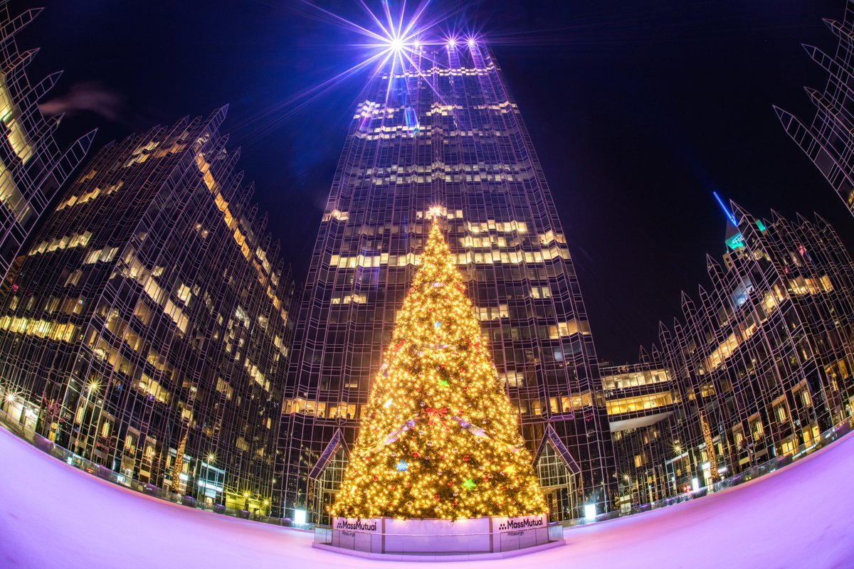 DaveDiCello's tweet image. The lights atop One PPG Place shine bright over the Christmas tree in downtown #Pittsburgh this morning, in this fisheye view from the edge of the ice rink.
