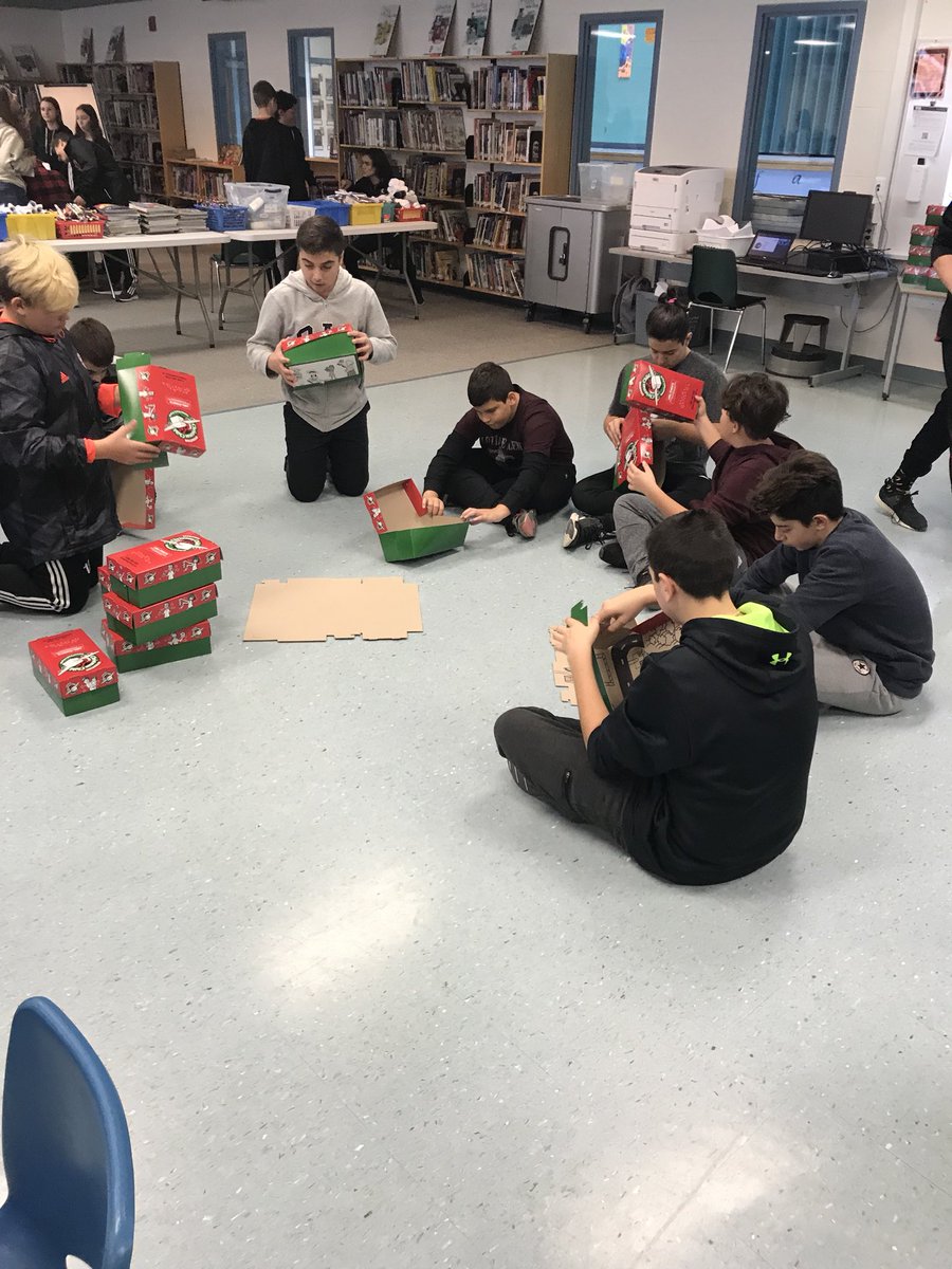 MorizioClass's tweet photo. Busy SJB elves helping to make #operationChristmasChild boxes with all the amazing donations they brought #jbapt #dpcdsb https://t.co/wsa27B583F