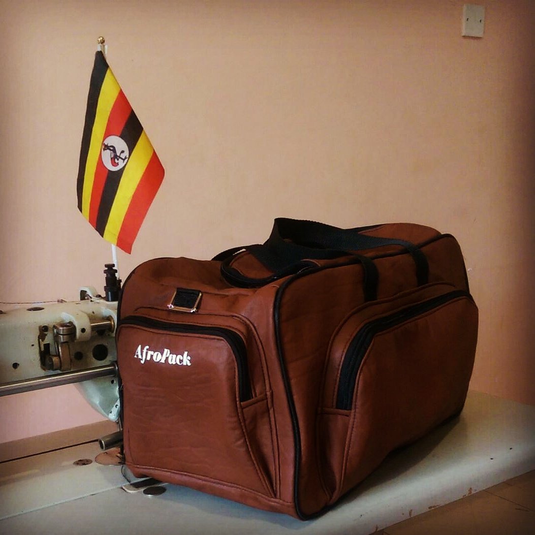 OdurDerrick's tweet photo. @wizkidayo Take this with you, as a gift from Uganda. #AfroPack bags, manufactured & customised from Uganda https://t.co/9oNlaTVRQb