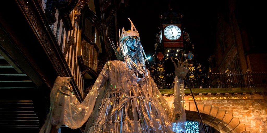 Go_CheshireWest's tweet photo. Festive lanterns will light up Chester on Thursday. The Queen of Light joins hundreds of school children for the parade. The parade leaves Town Hall Square at 7pm  https://t.co/5iRy9SSLxG #ChesterHour https://t.co/h2gWPqM2ca