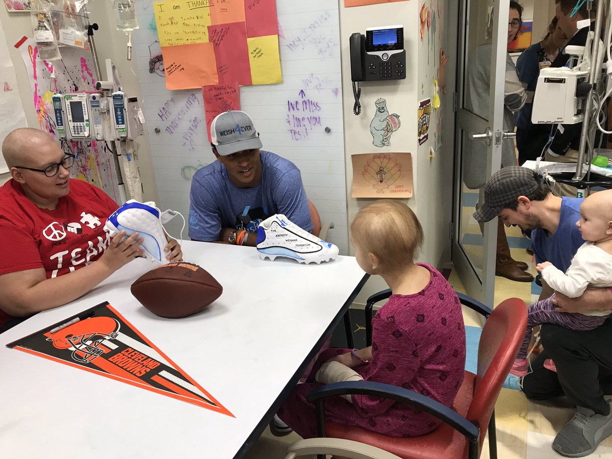 Browns's tweet photo. For Unboxing Day @DKizer_14 saw his #MyCauseMyCleats for the first time with patients at @UHRainbowBabies 

He's supporting @Weish4Ever this Sunday https://t.co/v1bbBZDlil