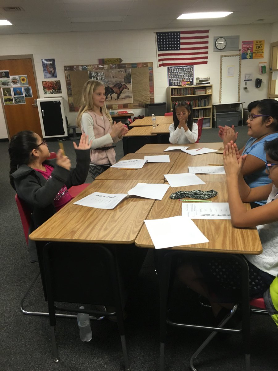 MrsZemp5th's tweet photo. 2nd -5th grade reading intervention group clapping out syllables. https://t.co/cJKdf38GOP