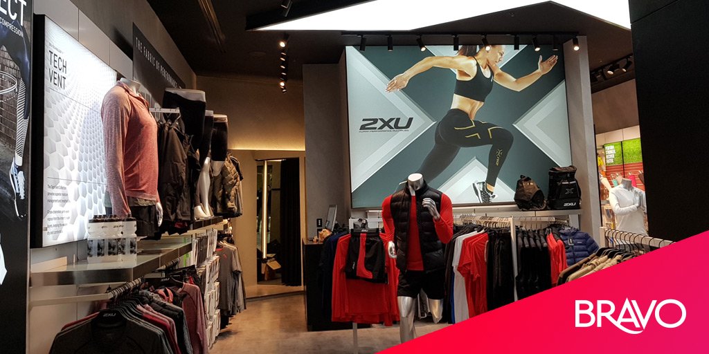 bravoprint's tweet photo. We get shutter happy when we see one of our fabric prints and light-boxes in the wild. The guys @TheOfficial2XU really know how to set-up their stores to impress. #fabricprinting #retailmerchandising #christmasshopping https://t.co/QyhIEdkuLl