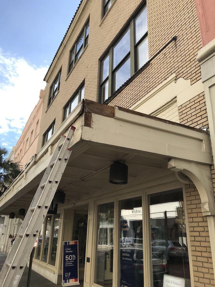 Doing some awning repairs on King St. In Charleston, SC