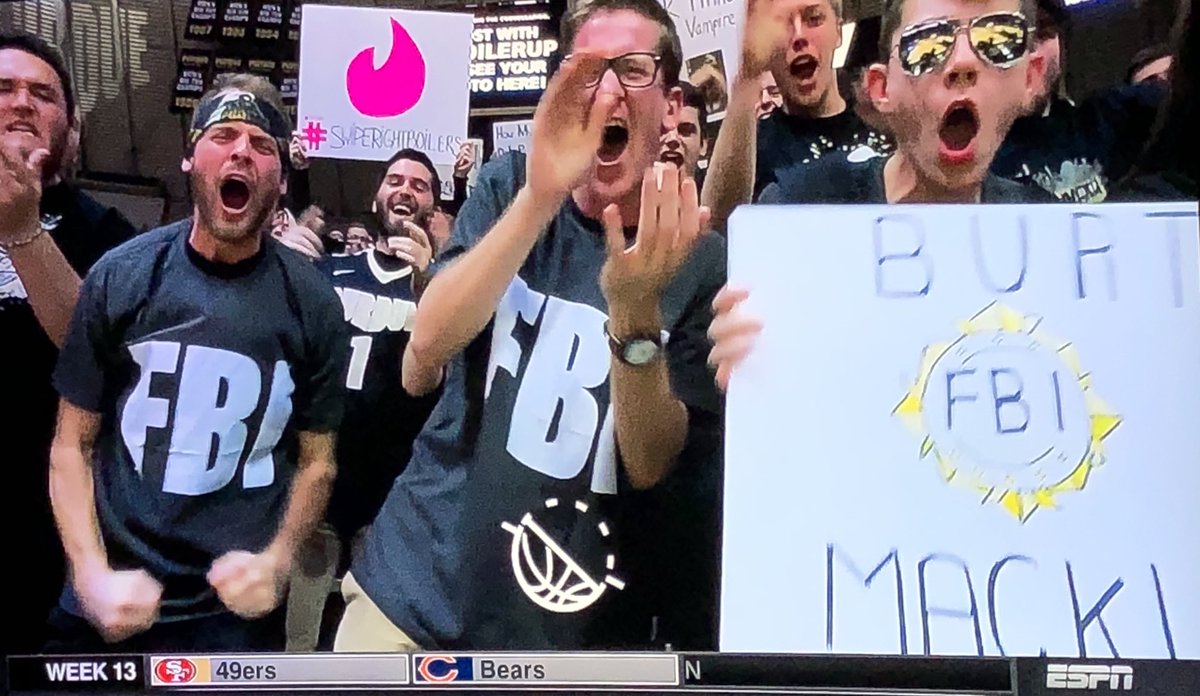 KySportsRadio's tweet photo. Purdue’s student section is wearing FBI shirts tonight against Louisville https://t.co/w9CgENIpds