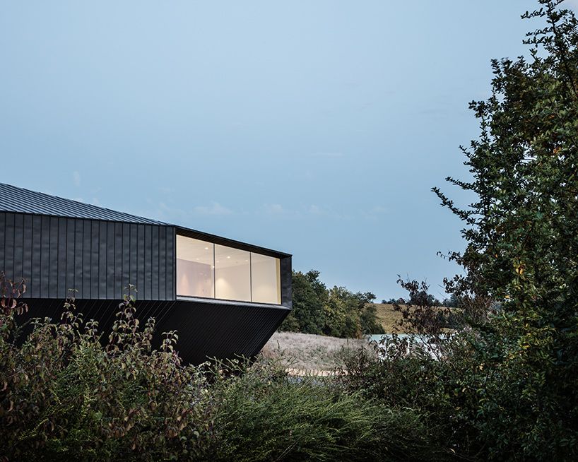 designboom's tweet photo. tetrarc embeds monolithic convention center into the landscape of southwestern france https://t.co/fFiESot1gr https://t.co/53xIgTGj2D