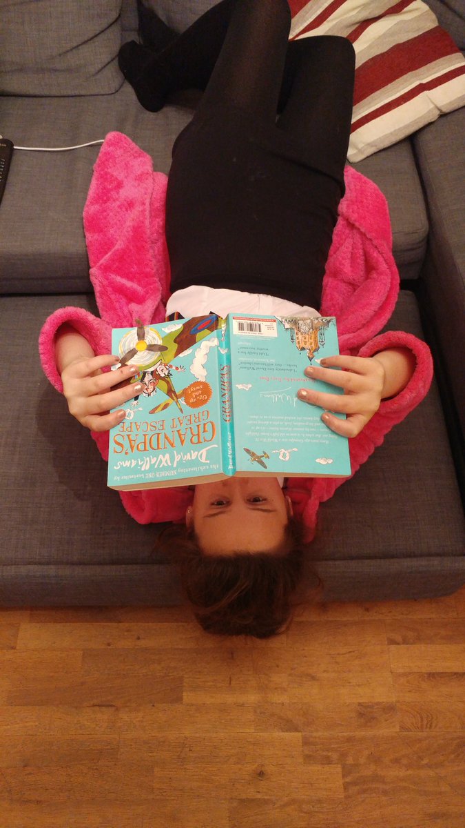 gordon595's tweet photo. @WBurghPrimary Beau cant decide where is best to read! In the wardrobe? Upside down? Or just top of the stair???? #BookWeekScot #WillybugsReads #BookDares https://t.co/u5KCIHWyMV