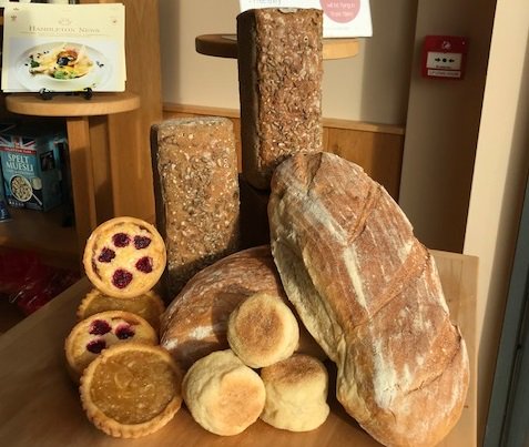 HambletonBakery's tweet photo. The #TalentedTania has been working her magic on our shop windows - this window includes the delicious Raspberry & Coconut Tart. #local #hambletonbake https://t.co/4LCAVDYmm5