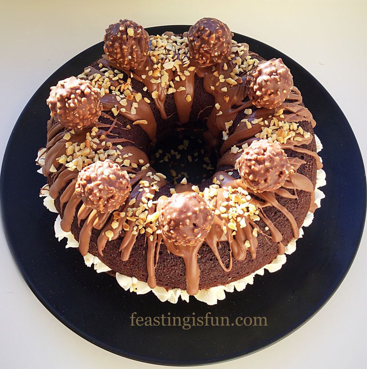 Chocolate Hazelnut Baked Giant Doughnut can also be baked in 2 x 8 inch sandwich cake tins 😉 feastingisfun.com/chocolate-haze… #RecipeOfTheDay #chocolate